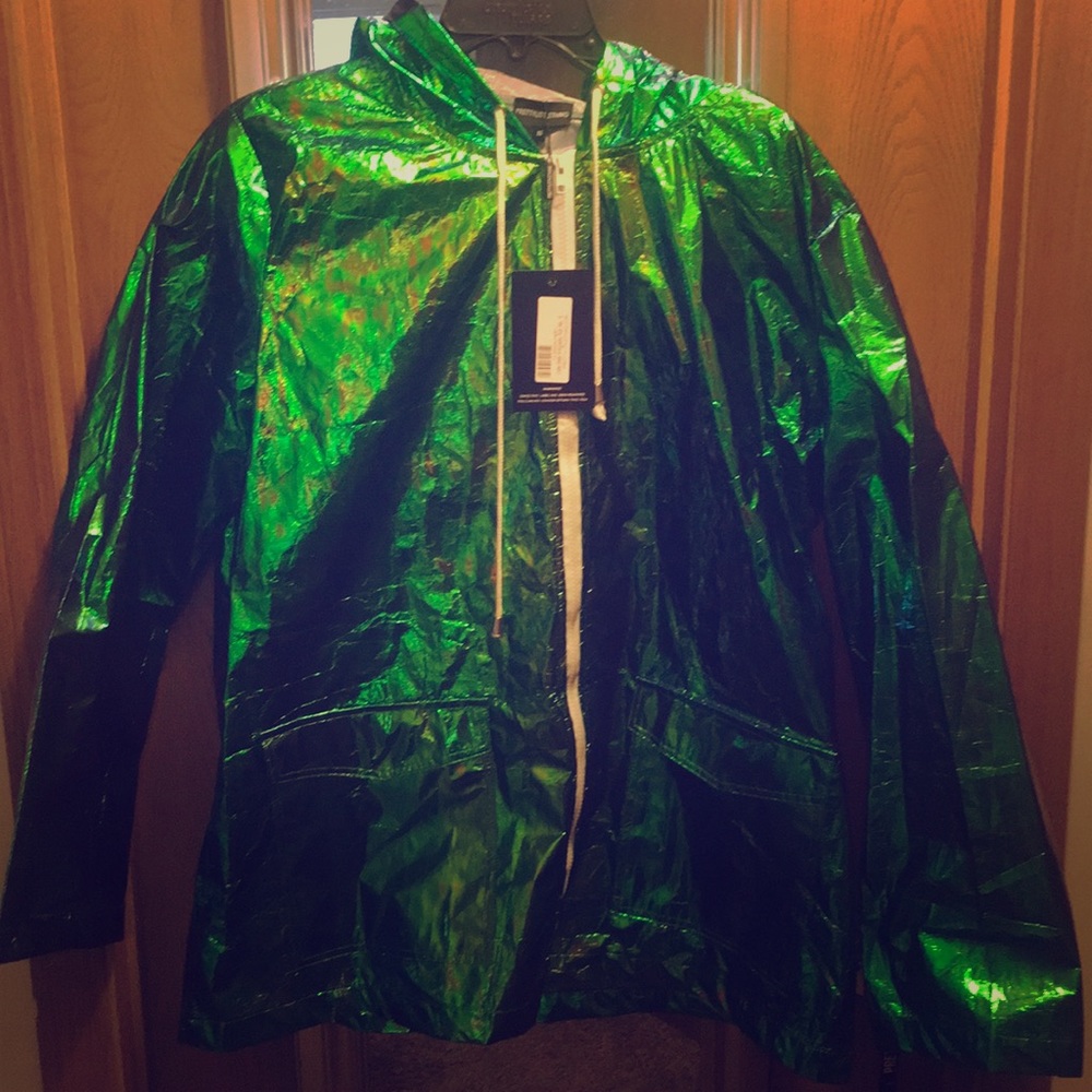 Cobie green holographic rain jacket.